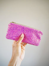 This sparkly hot pink sunglasses case can also be used as a pencil case, to keep makeup brushes, or for glasses.