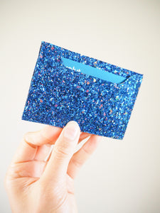 This royal blue glitter card holder is handmade and has a mix of rose gold glitter.