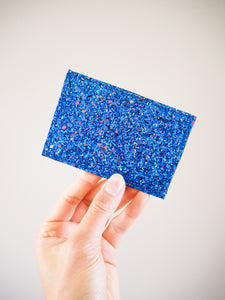 This handmade sparkly royal blue card holder fits neatly inside your pocket and can keep your bank cards together safely inside the card slot.