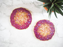 This set of Plum Geode Resin Coasters has been made with epoxy resin that is heatproof.