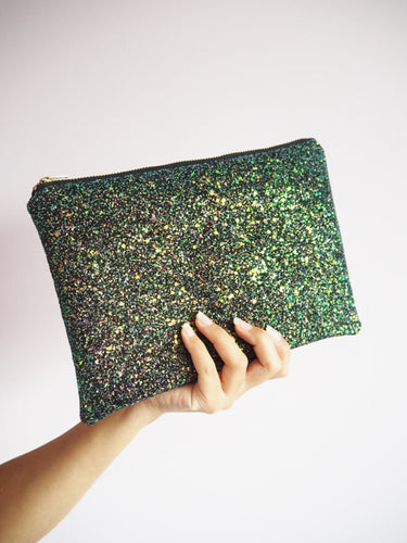 This black glitter clutch bag with copper and green has a gorgeous shimmer that catches the light.