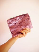 This dusty pink crushed velvet makeup bag is handmade with a cotton lining consisting of a floral print.