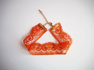 rust orange lace choker necklace with gold clasp