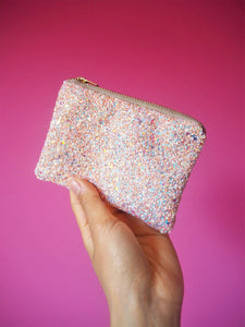 Pastel glitter coin purse with an iridescent sparkle